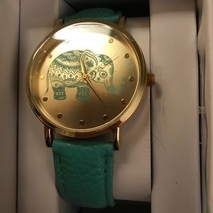 Elephant watch with gold accents